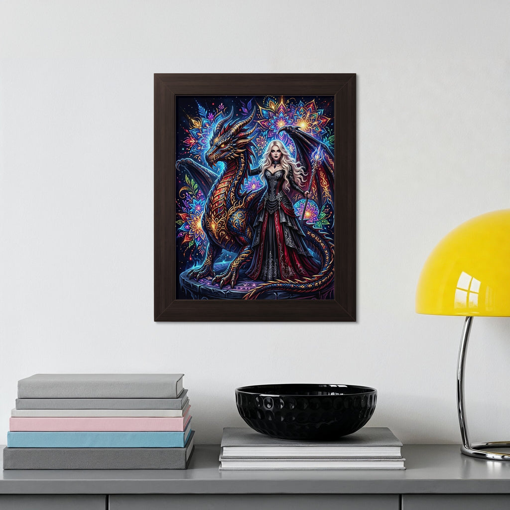 Fantasy art print of a woman with a dragon, framed and displayed above books.