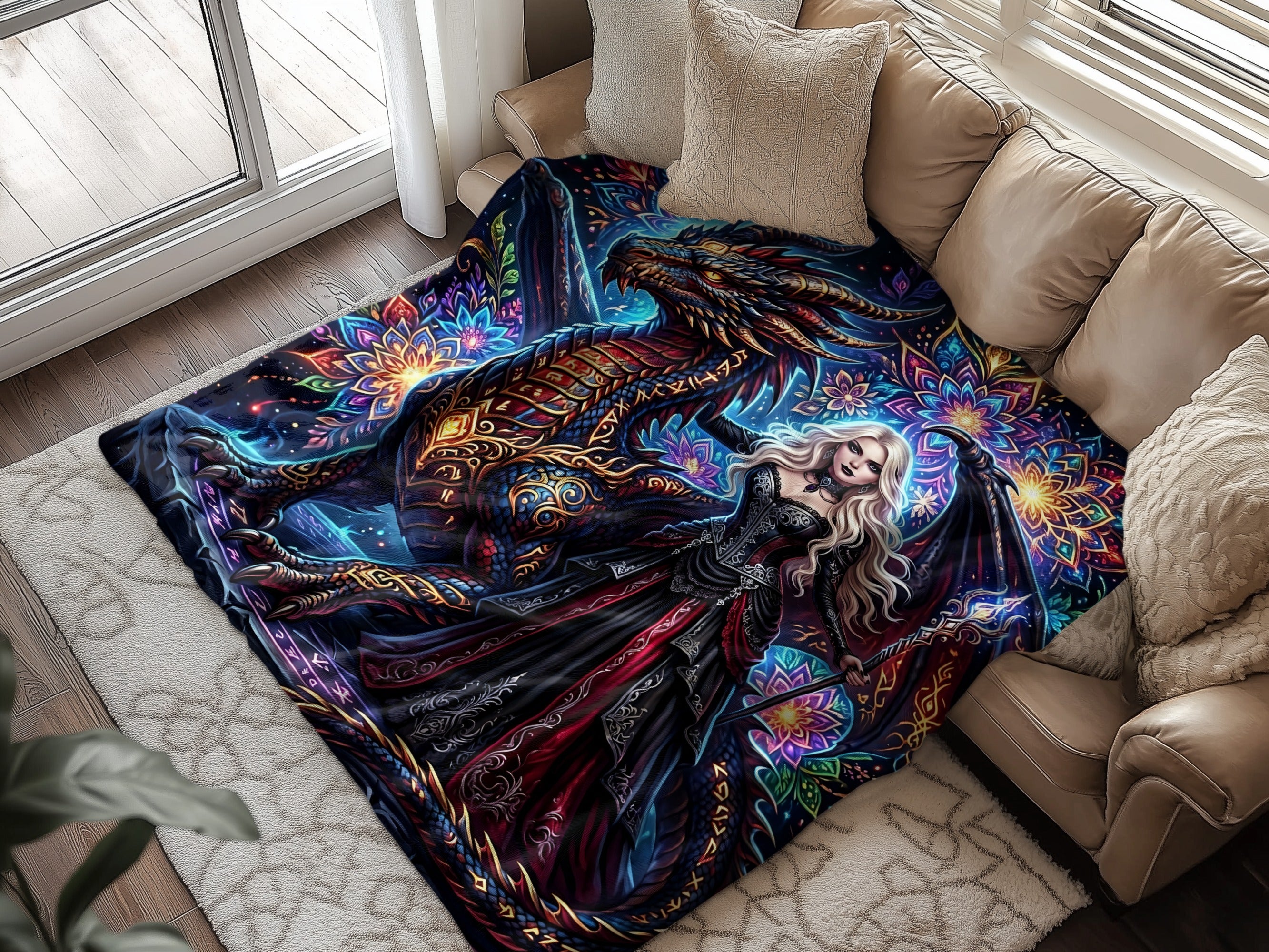 Woman with wings holding a staff on a blanket with a dragon.
