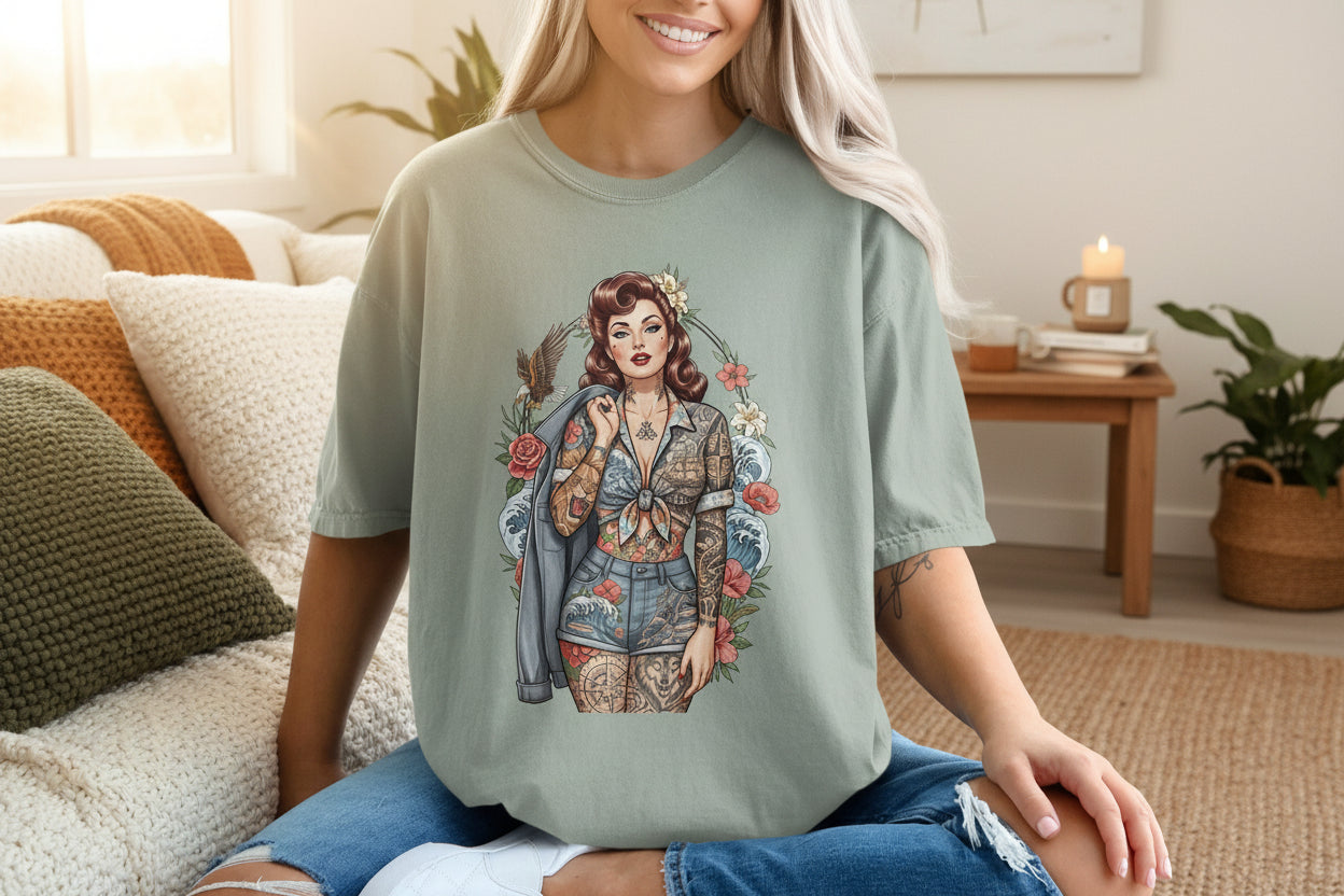 Tattooed Pinup Woman Floral Eagle Ocean Waves product type
Pinup Girl, Tattooed Woman, Floral Design, Eagle Art, Ocean Waves, Rockabilly Style, Vintage Aesthetic, Graphic Tee, Retro Fashion, Unique Design, Statement Shirt, Alternative Wear, Casual Apparel, Oversized Fit, Pinup Art, Tattoo Fashion, Ladies Tee, Bird Design, Wave Print, Flower Motif