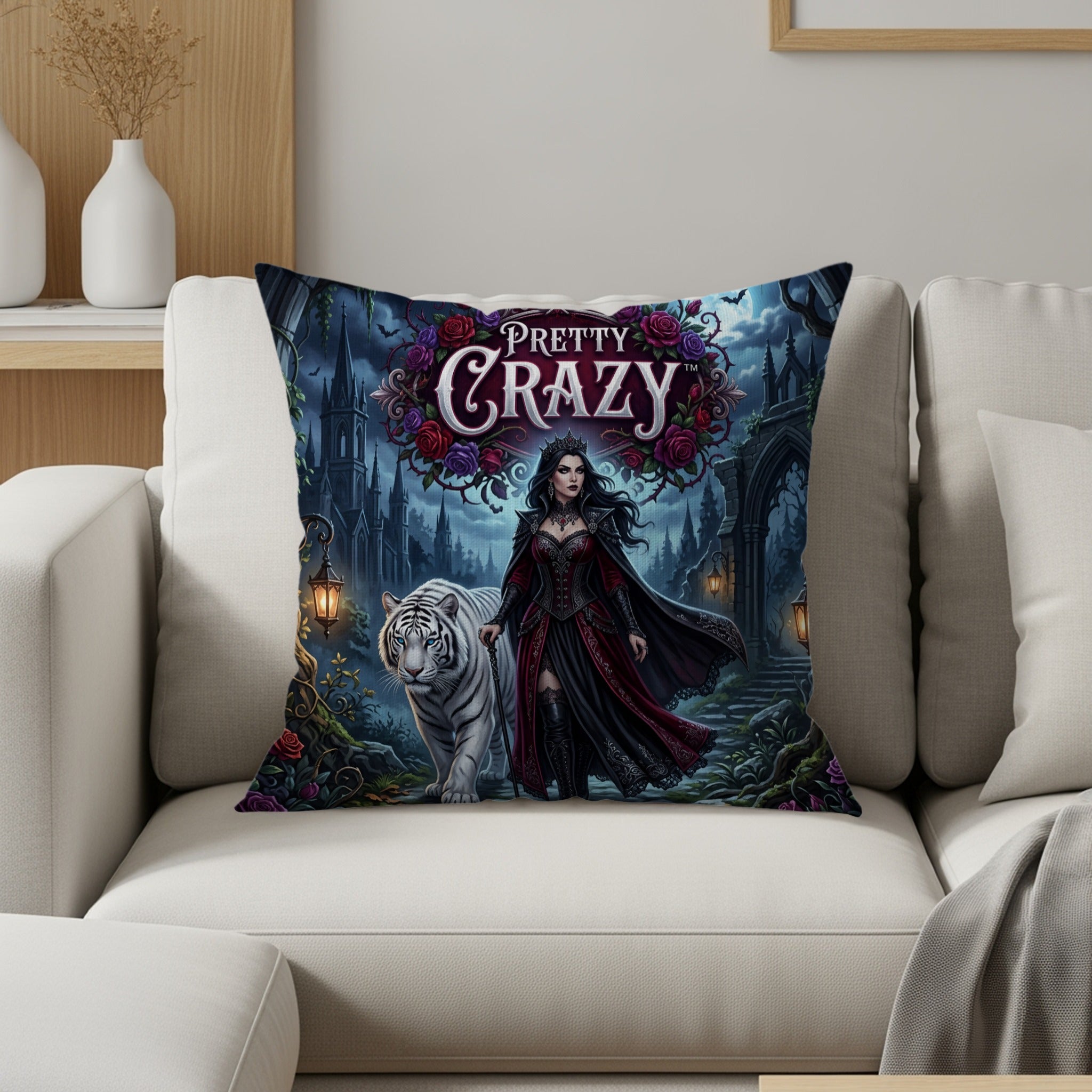 Gothic illustration on pillow: woman in dark dress, white tiger, ornate castle.