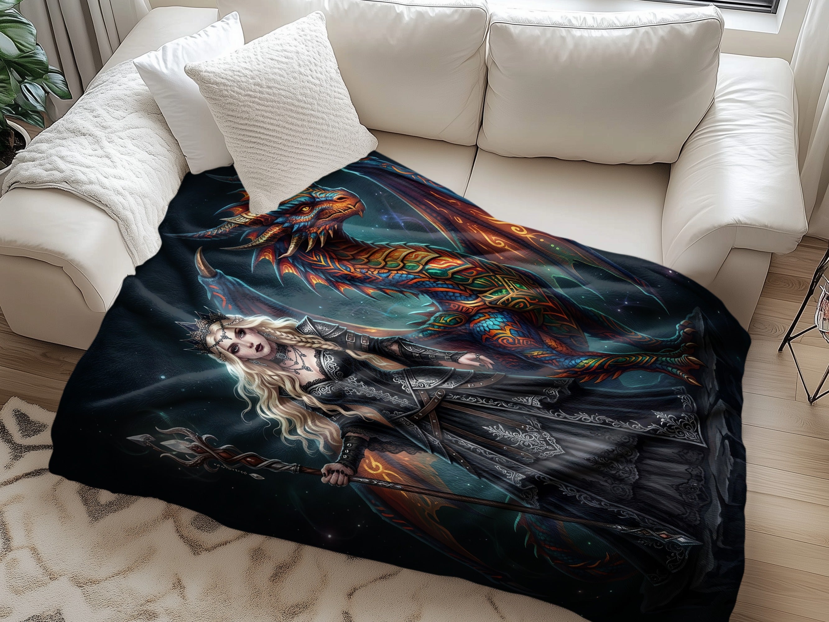 Fantasy art blanket with a blonde woman in a dark dress and a colorful dragon.